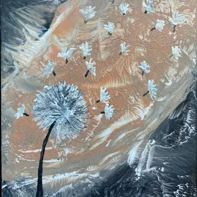 Encaustic beeswax artwork of a dandelion wish with seeds blowing in a textured orange and black landscape