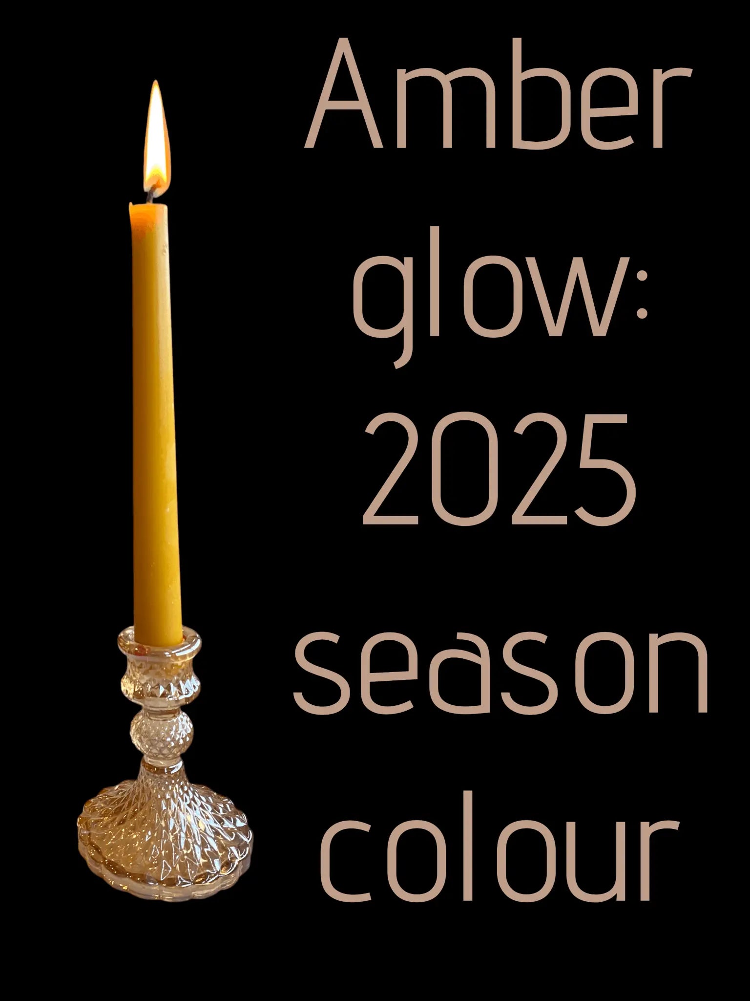 Lit amber beeswax taper candle in a crystal candlestick against black background with text